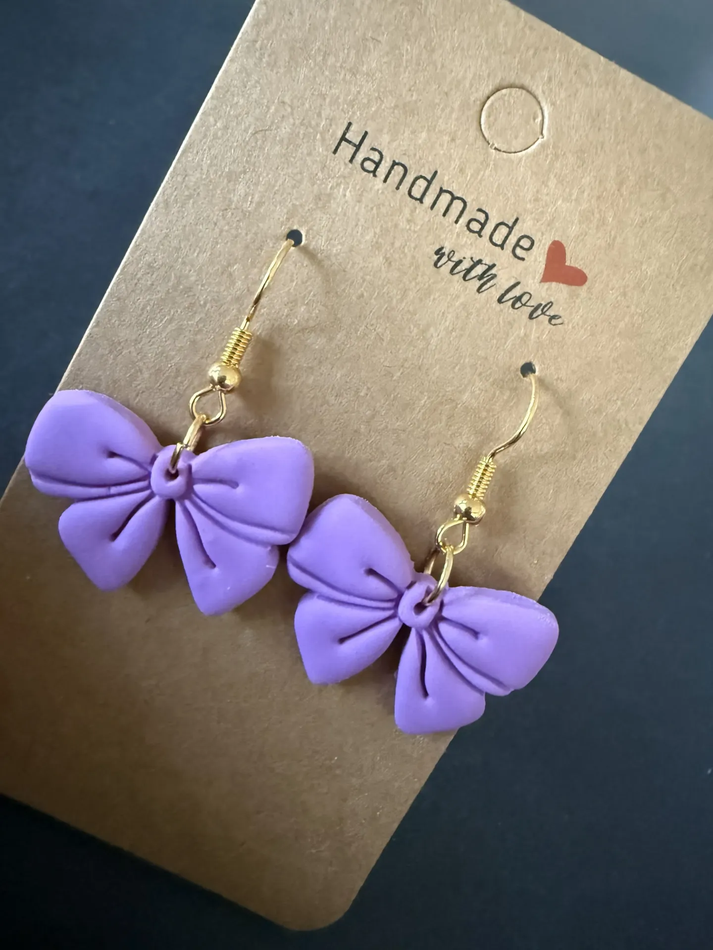 Hanger strikjes lila